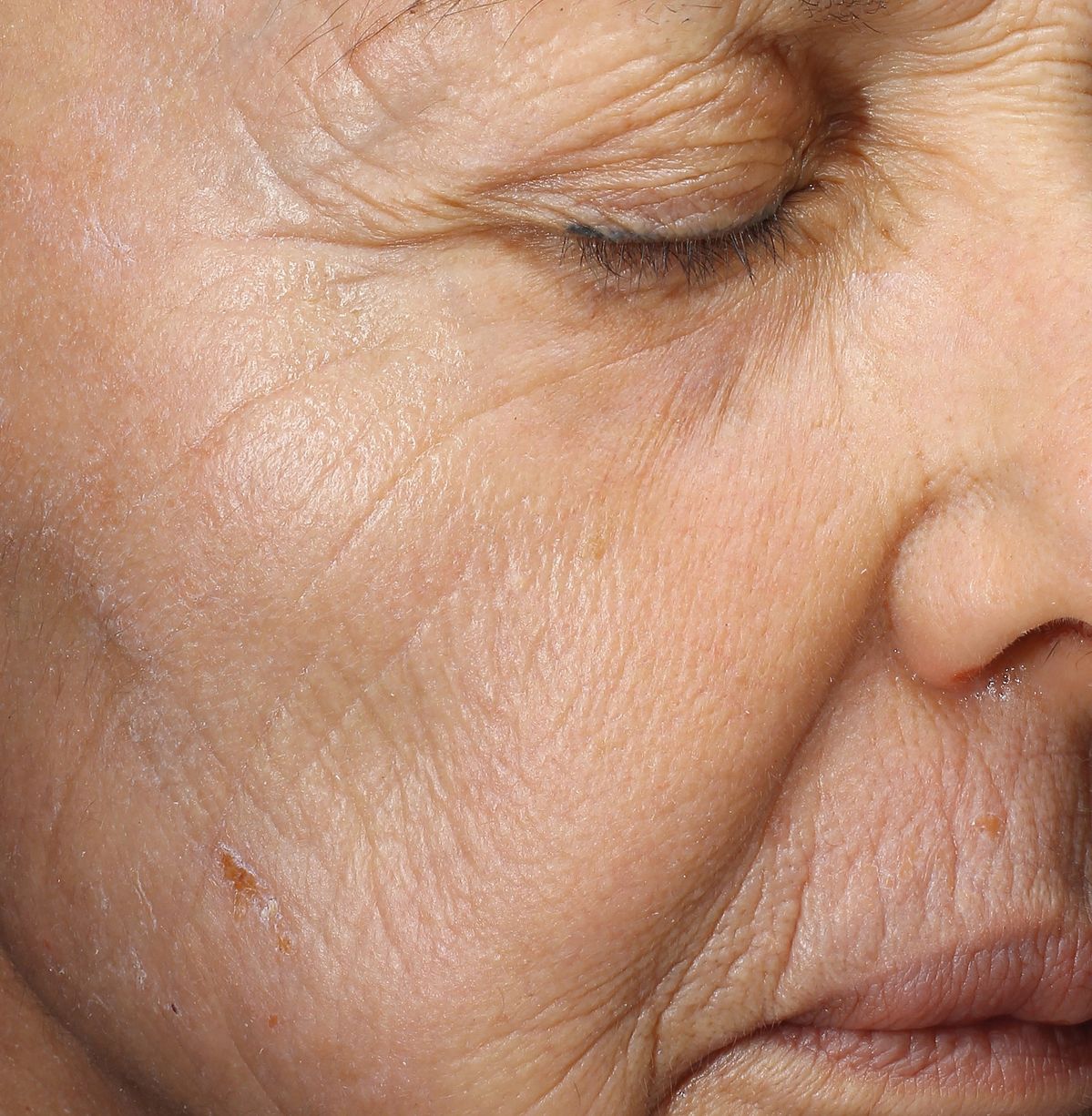 Close-up of natural fine lines around a mature woman's eye